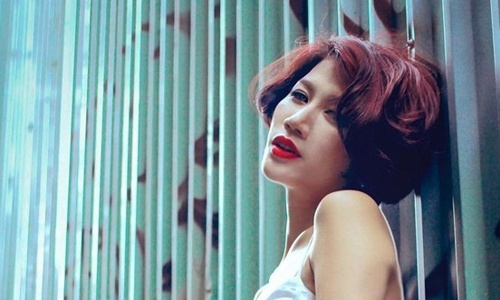 Nguoi mau Trang Tran linh 9 thang tu treo hinh anh