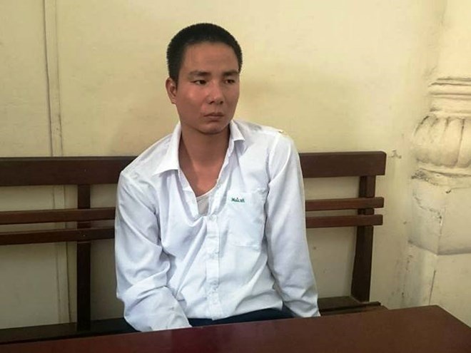 Tài xế Dũng tại cơ quan công an. Ảnh: VietnamPlus.