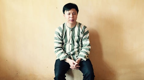 Long tại cơ quan điều tra.