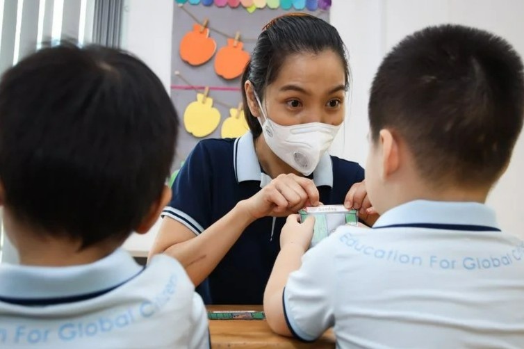 Hai thang mo cua truong hoc day kho khan o TP.HCM hinh anh