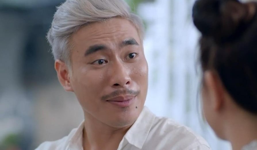 Kieu Minh Tuan dang chung lai hinh anh