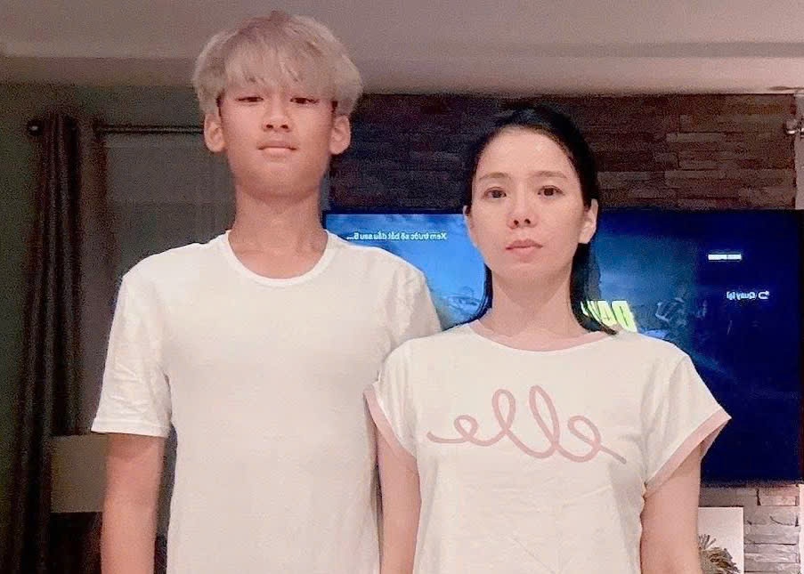 Con trai Le Quyen cao 1,76 m o tuoi 14 hinh anh