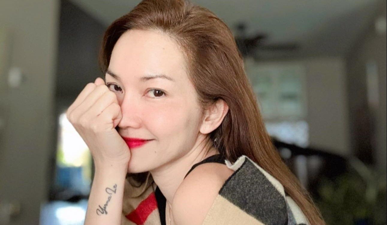 Kim Hien giua tin ly hon hinh anh