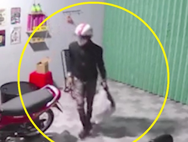 Camera ghi hinh ten trom dot nhap tiem lam toc hinh anh