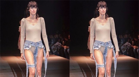 Xuat hien chiec quan jeans rach phan cam tren san dien thoi trang hinh anh