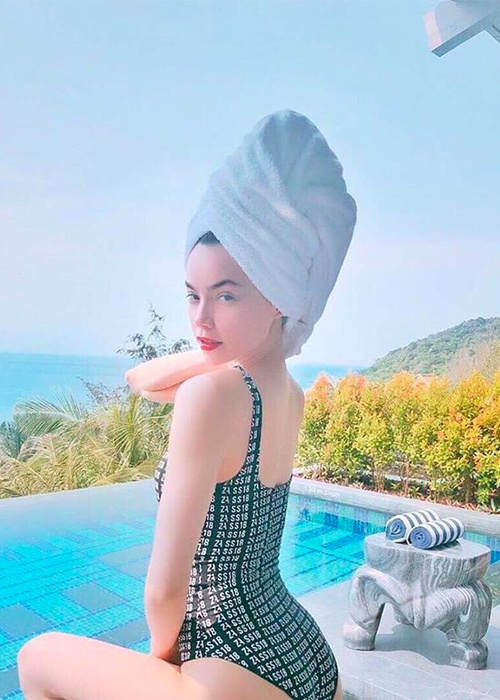 Trang phuc di bien cua Sao Viet trong mua he anh 2