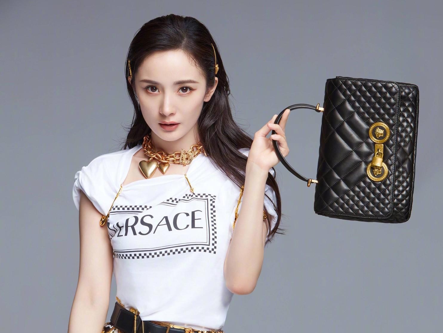 Nguoi dan Trung Quoc doi tay chay nha mot Versace va Duong Mich hinh anh