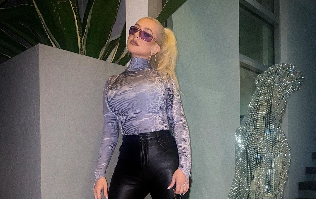 Christina Aguilera dung tui xach san xuat tu nam 2004 hinh anh