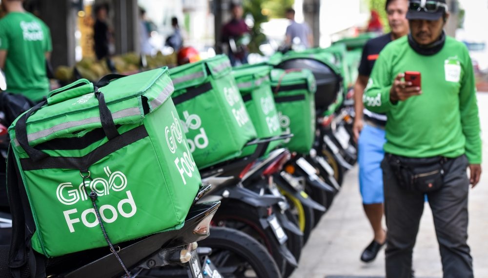 So Giao thong Ha Noi 'nhac nho' Grab, Gojek, be hinh anh