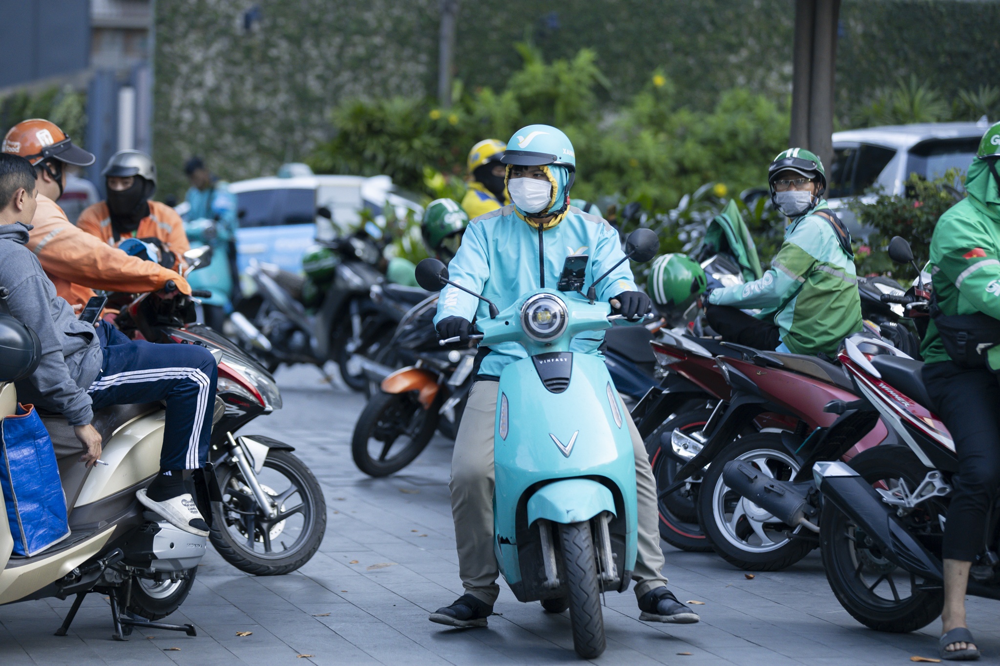 Cuoc dua 'song ma' Xanh SM va Grab tren thi truong goi xe hinh anh