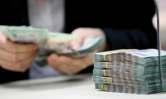 Ngan hang don dap rao ban no truoc Tet hinh anh