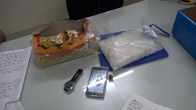 Giau mot kg ma tuy da trong hop banh chuyen ve dat Cang hinh anh