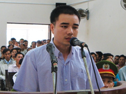 'Ho Duy Hai van nhan toi, chi xin giam an' hinh anh