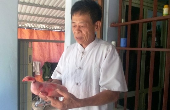 Ông Nguyễn Văn Minh bên con