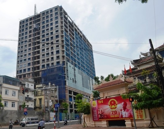 Co the cuong che dien tich vi pham tai toa nha 8B Le Truc hinh anh