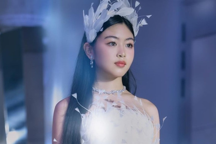 Con gai Quyen Linh, 'hot girl IELTS' do sac voi vay cuoi hinh anh