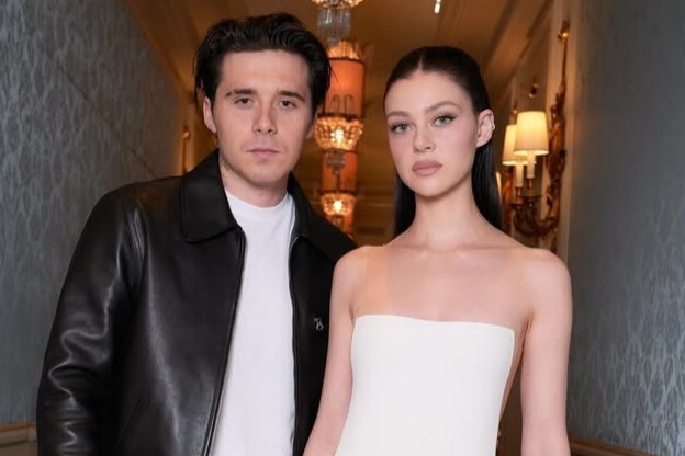 Con dau David Beckham theo duoi mot ban nude hinh anh