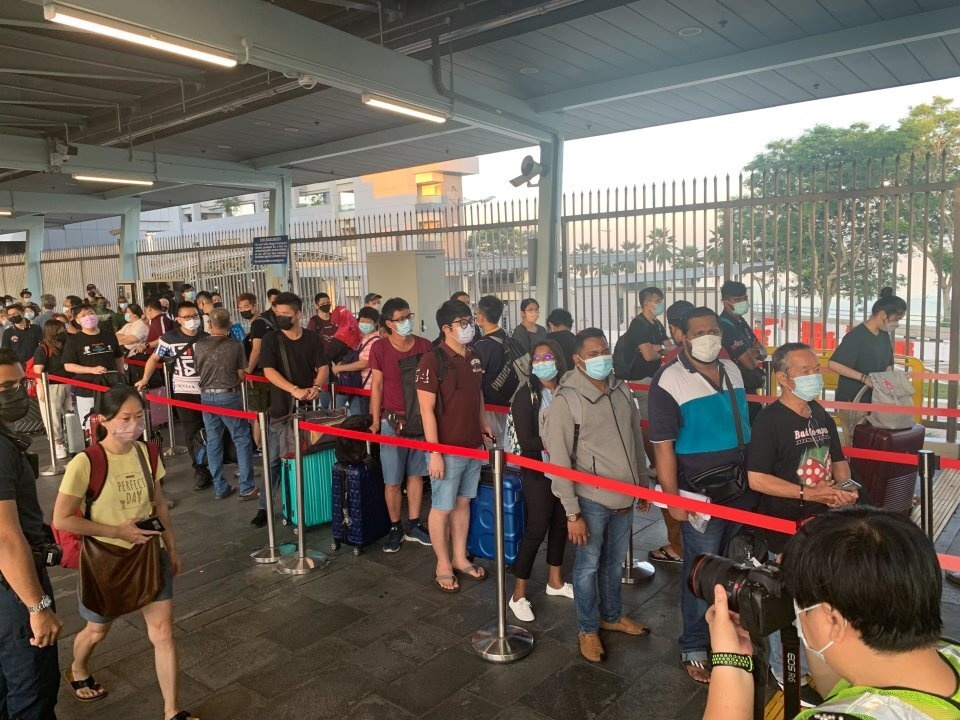 Singapore - Malaysia mo cua bien gioi anh 1