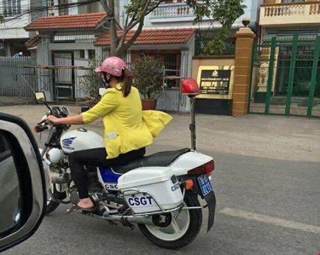 Xac dinh danh tinh co gai lai xe dac chung cua CSGT hinh anh