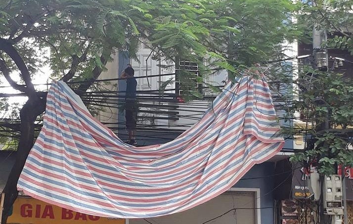 Nguoi dan ong Han Quoc chet trong tu the treo co truoc hien nha hinh anh