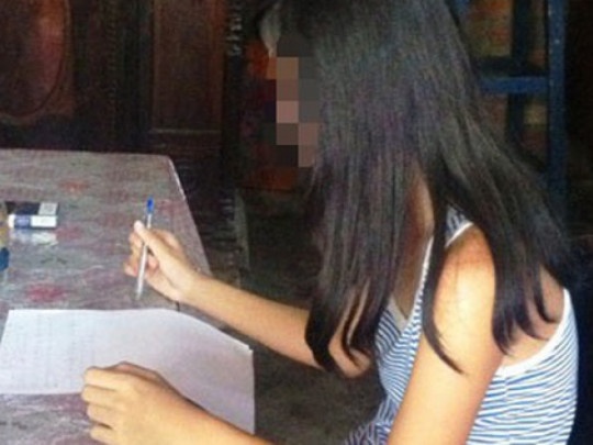 Gia dinh be gai nghi bi hiep dam phan ung voi ket qua giam dinh hinh anh