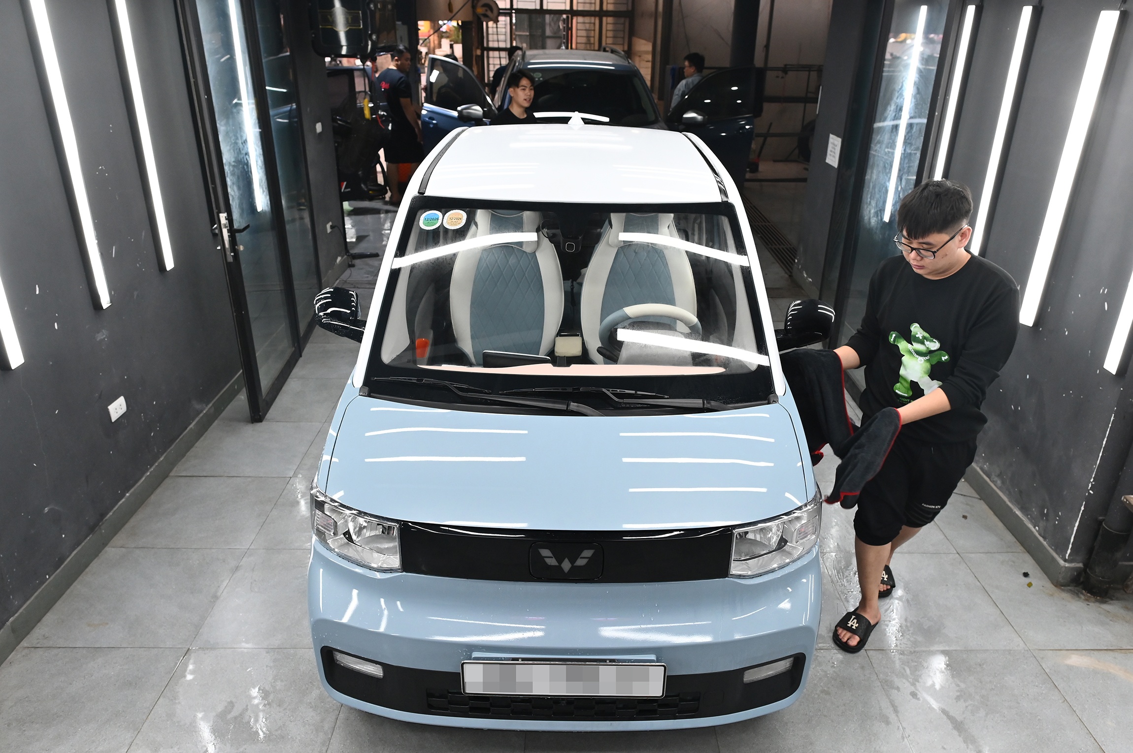 Dat lich truoc ca thang de rua xe dung ngay 29 Tet o Ha Noi hinh anh