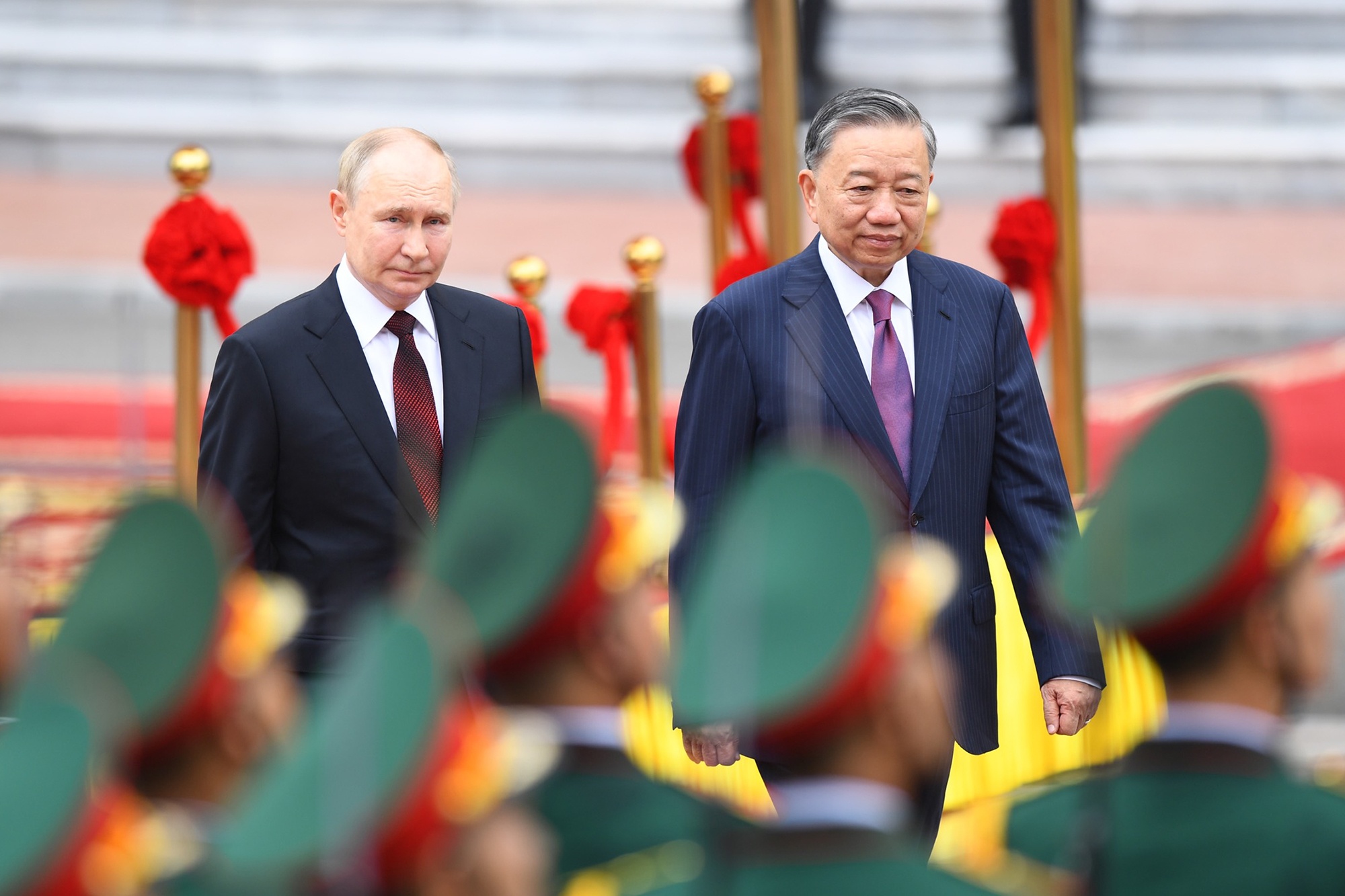 Chu tich nuoc To Lam chu tri le don Tong thong Putin hinh anh