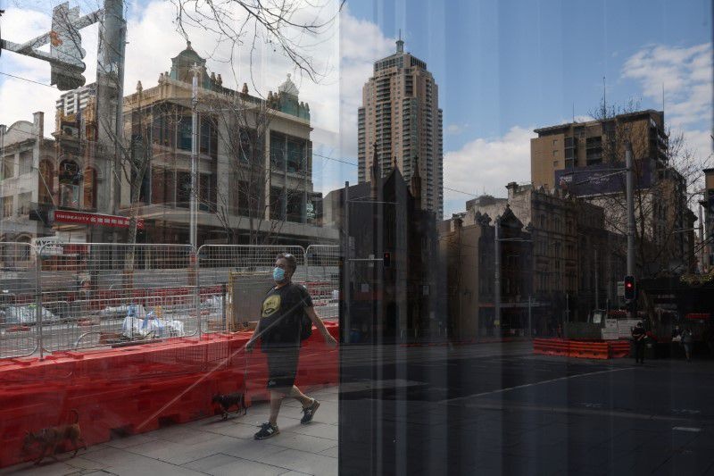 Mot quoc gia, hai buc tranh phong toa vi bung dich tai Australia hinh anh