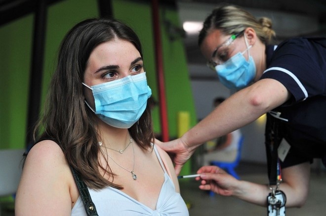 Nen phan phoi them vaccine cho nuoc nao to chuc tiem chung hieu qua hinh anh