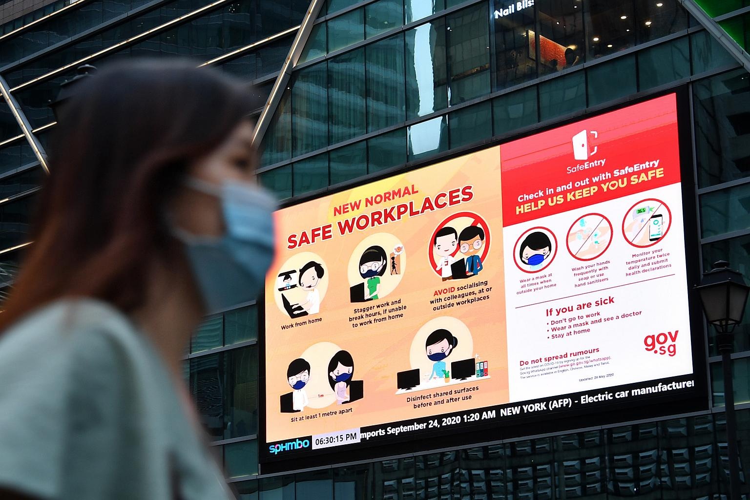 Vi sao Singapore giam cong bo ca mac moi moi ngay? hinh anh