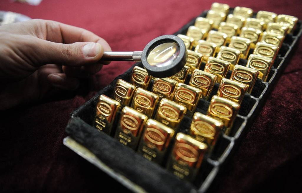 Gia vang the gioi tiep tuc lao doc hinh anh