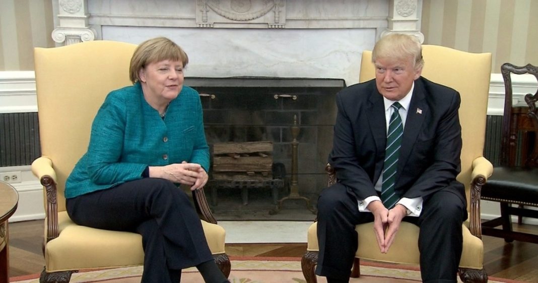 Khoang khac guong gao giua ong Trump va ba Merkel hinh anh