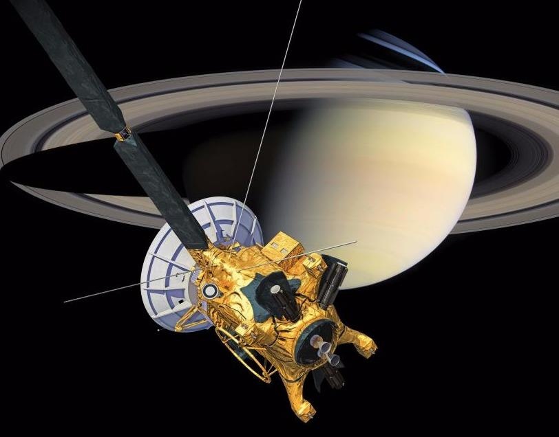 Phi thuyen Cassini bay vao vung bi an quanh Sao Tho hinh anh