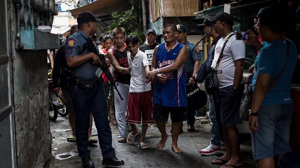 Canh sat Philippines noi doi ve vu no sung giet nguoi vo ly hinh anh