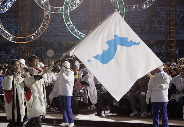 Han - Trieu Tien dieu hanh du Olympics duoi la co chung hinh anh