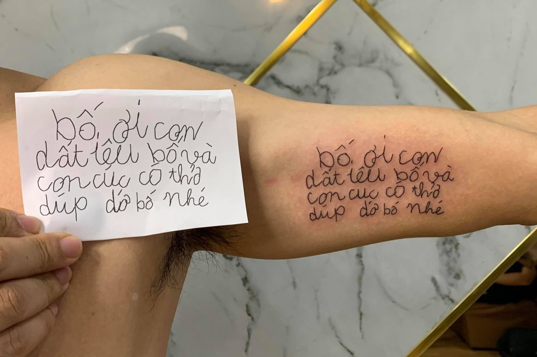 Cha xam buc thu cua con gai 4 tuoi len bap tay hinh anh