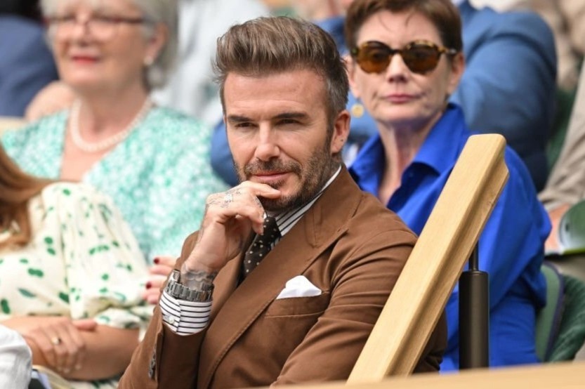 David Beckham tiep tuc gianh giai mac dep khi di xem quan vot hinh anh