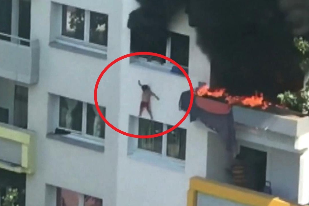 Hai dua tre nhay tu tang 4 xuong de thoat khoi dam chay o Phap hinh anh