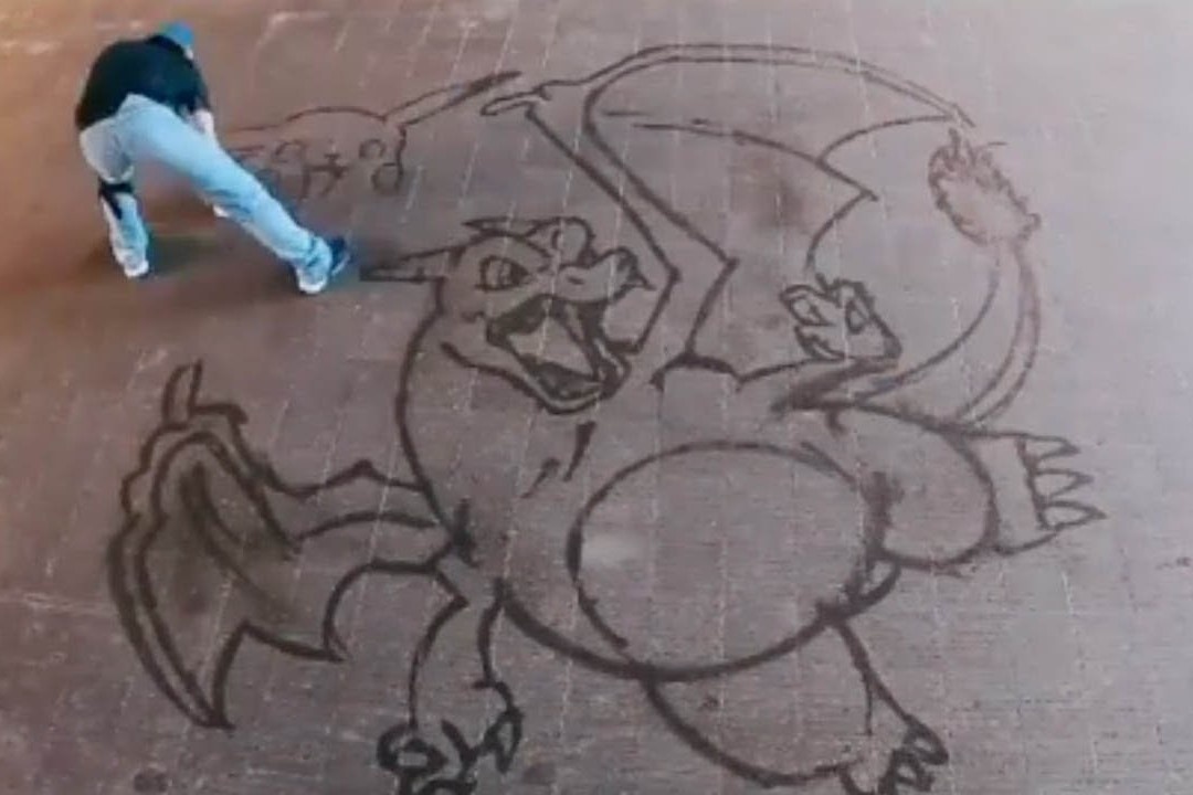 Chang trai Nhat ve tranh bang nuoc hinh anh