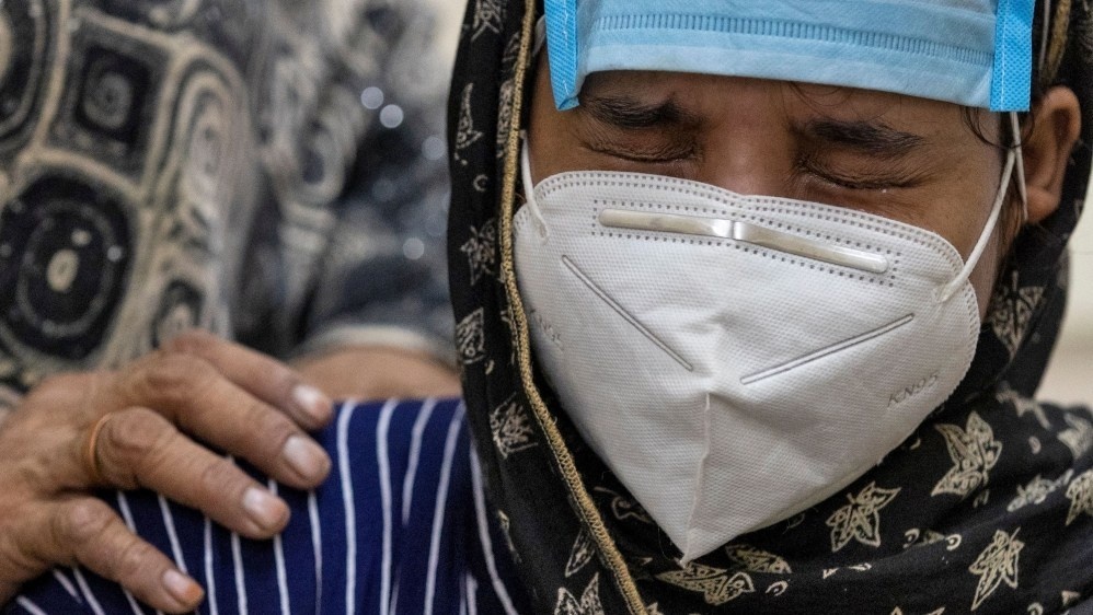 Ca nhiem Covid-19 toan cau vuot moc 12 trieu giua luc My rut khoi WHO hinh anh