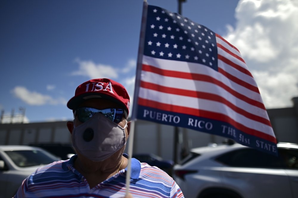 Ong Trump va ong Biden deu nham vao Puerto Rico anh 7
