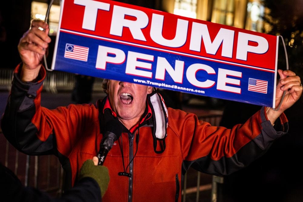 Ong Joe Biden dan truoc Tong thong Trump 3,4 trieu phieu pho thong hinh anh