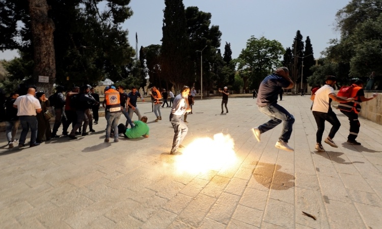 Canh sat Israel va nguoi Palestine dung do sau lenh ngung ban hinh anh