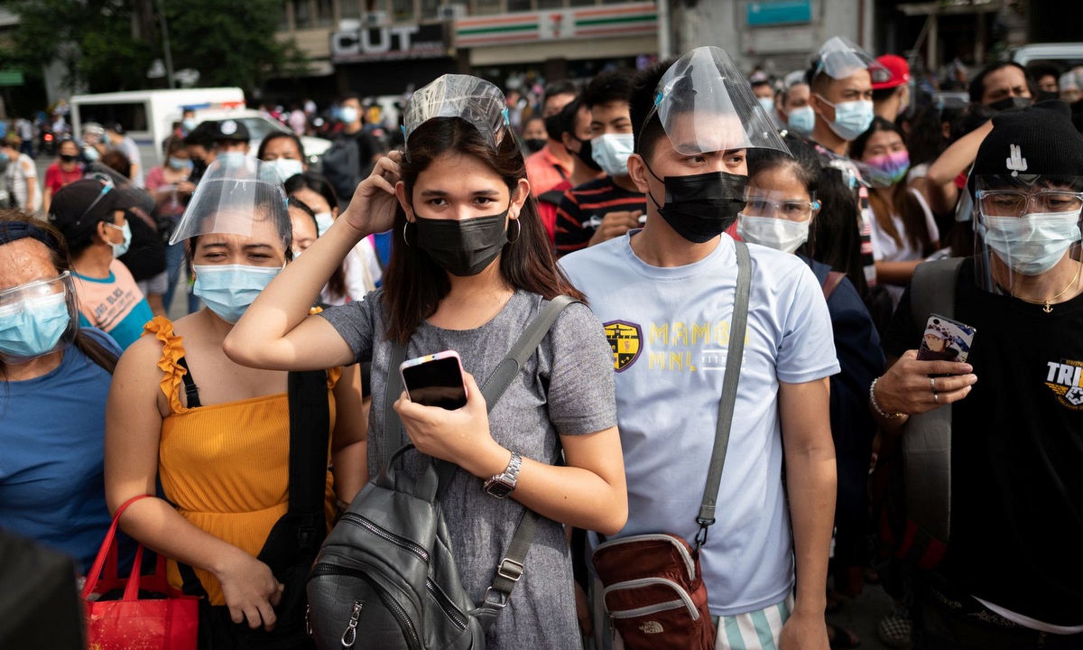 Nguoi Philippines do xo di tiem chung truoc gio phong toa anh 4