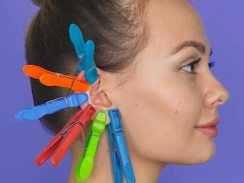 Tac dung khong ngo khi kep moc ao vao tai hinh anh