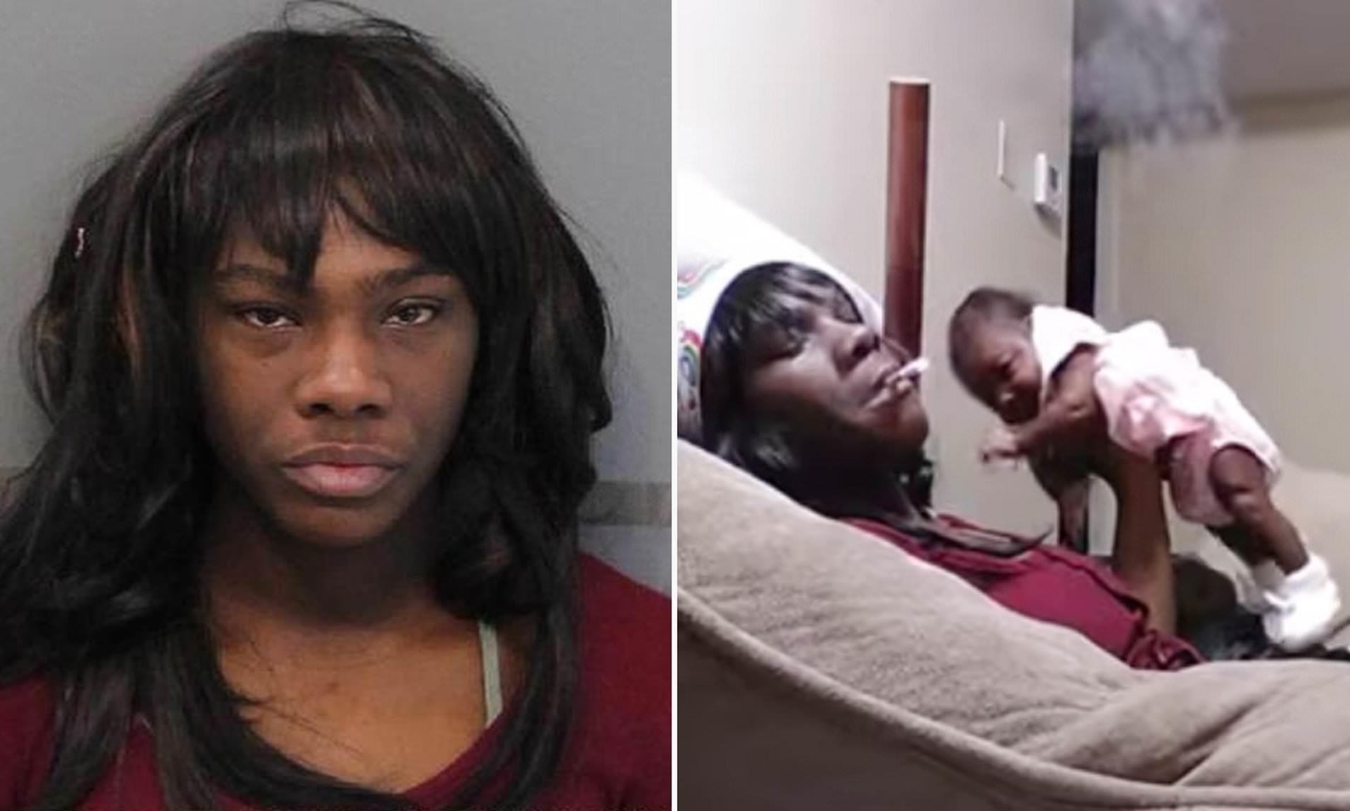 Nguoi phu nu vua hut thuoc vua be con gai mot thang tuoi hinh anh