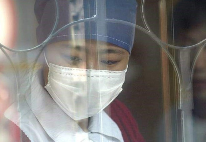 Viem phoi cap o Trung Quoc co the lay nhiem tu nguoi sang nguoi hinh anh