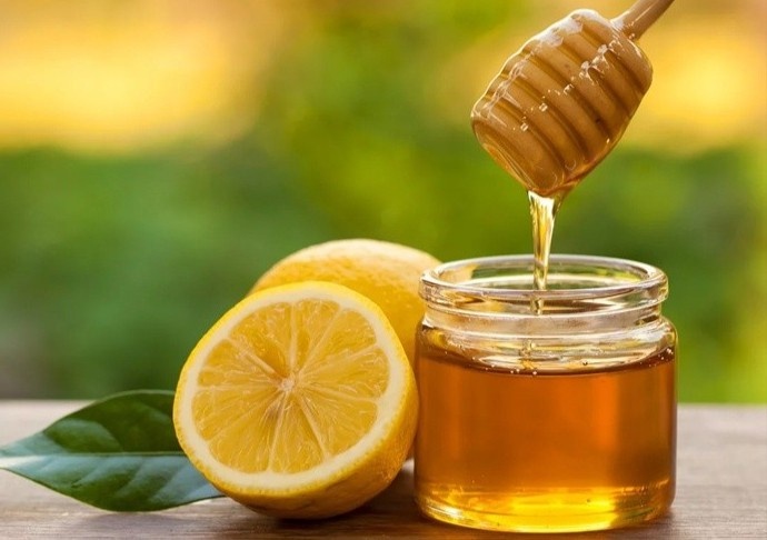 Loi ich khi uong mot coc nuoc chanh mat ong vao buoi sang hinh anh