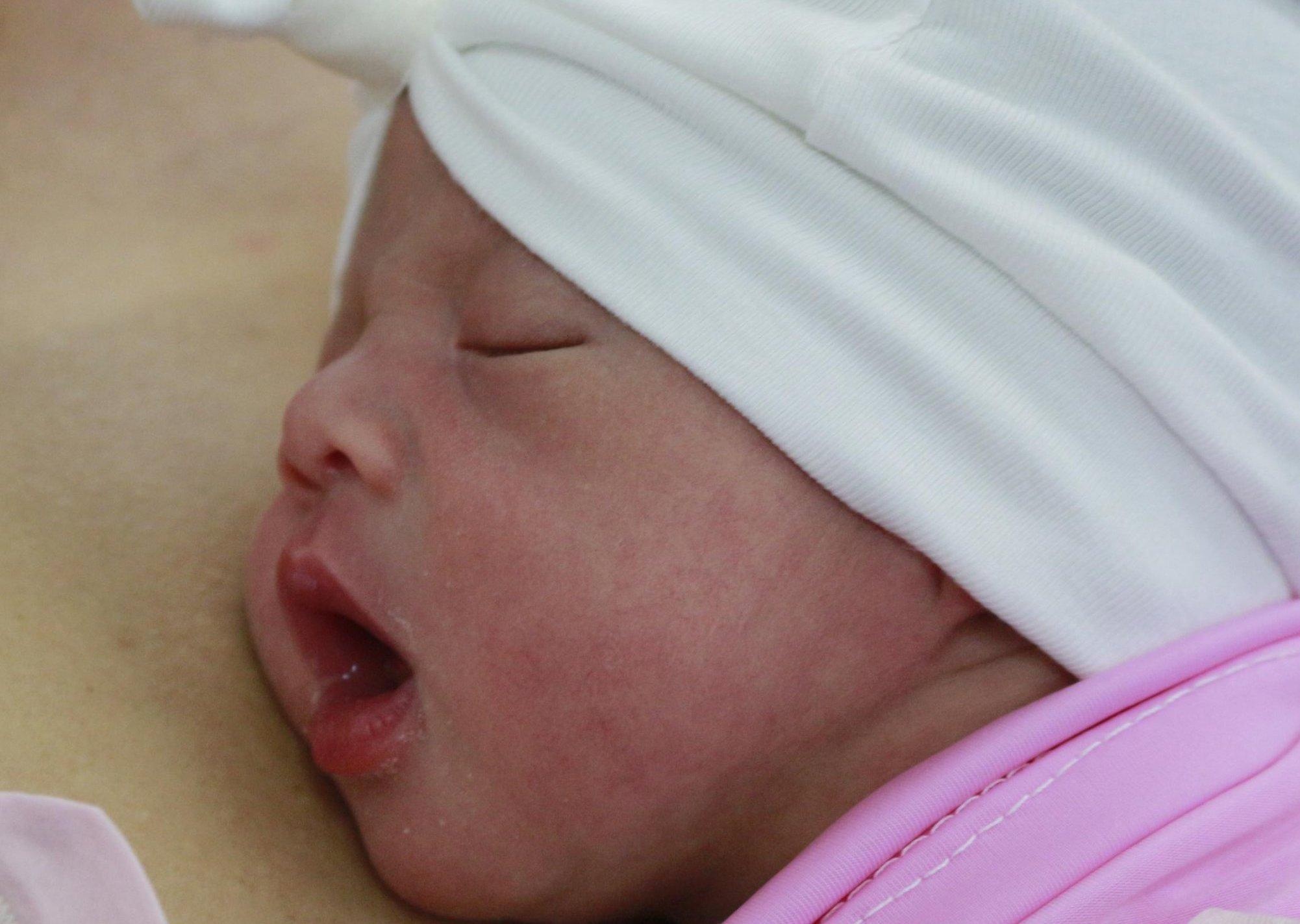 Nguoi phu nu sinh doi sau 11 nam hiem muon hinh anh