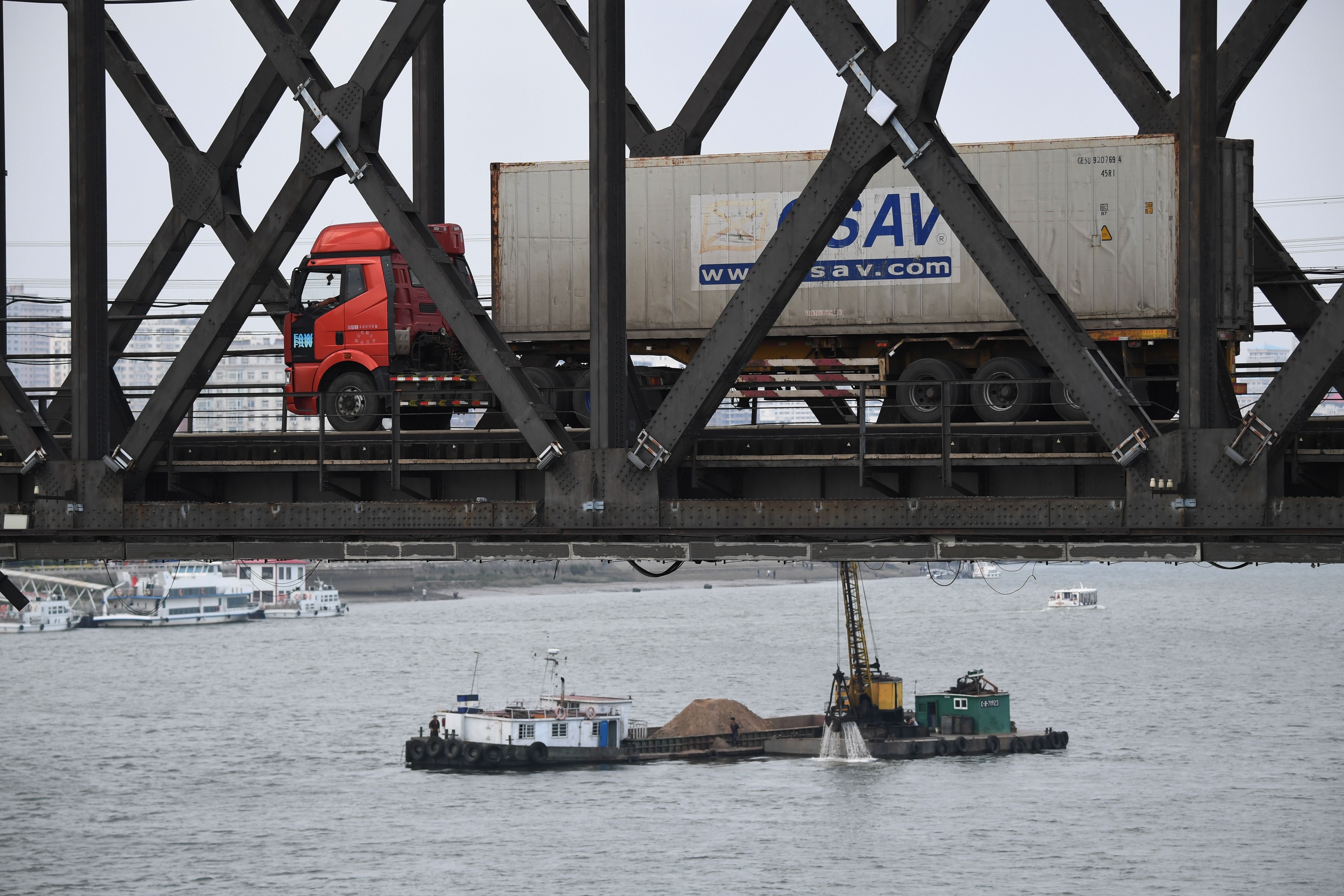 Trung Quoc yeu cau dong cua tat ca cong ty Trieu Tien hinh anh